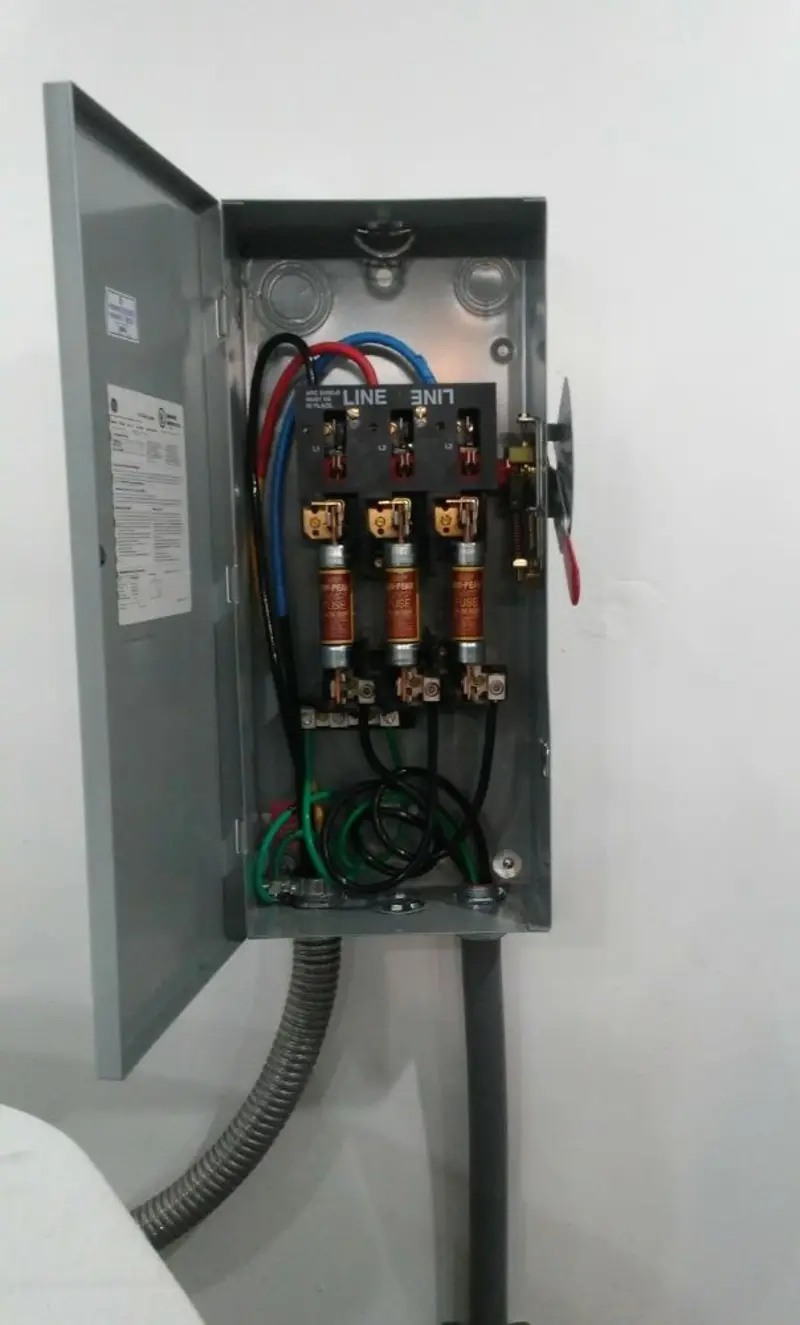 Three-phase disconnect switch installed for Smoke Detector Installation in Libby