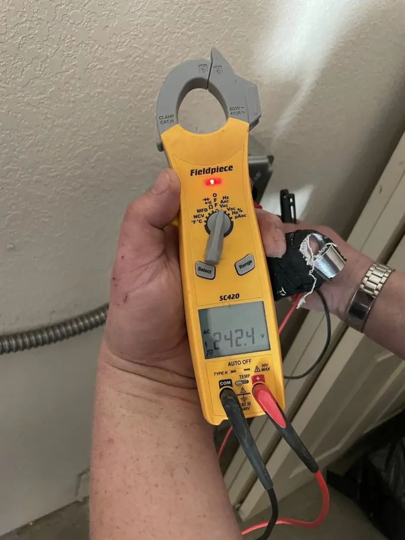 Voltage testing with clamp meter during Generator Installation in Libby